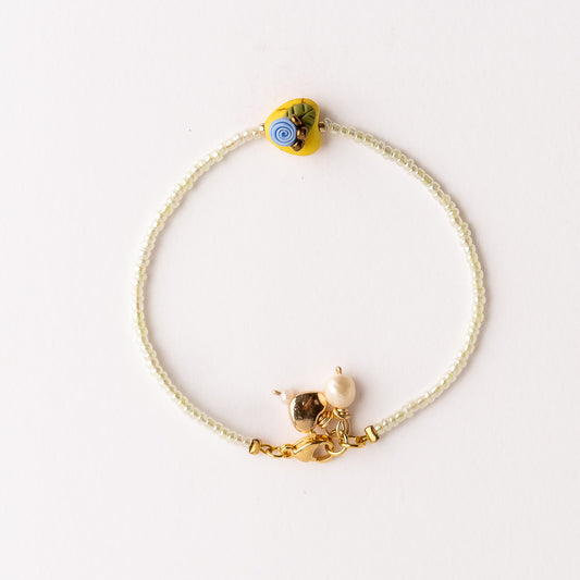 Pulsera Magnolia Corazón Amarillo con Flor Azul