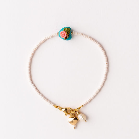 Pulsera Magnolia Corazón Turquesa con Flor Rosa